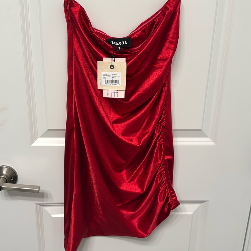 BRAND NEW tags on never worn. Seroya Malakai Dress